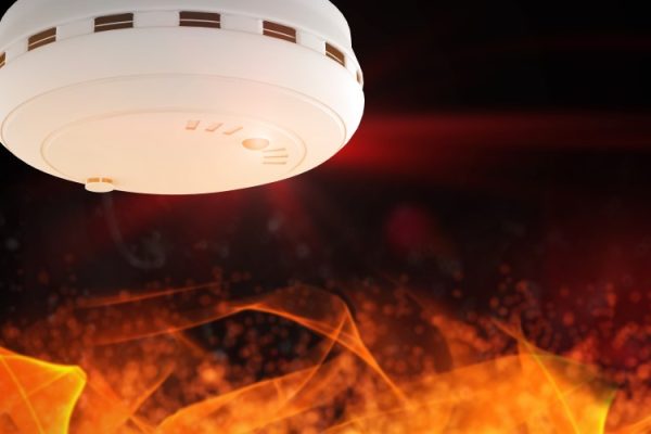 Smoke detector installed on a ceiling, part of a comprehensive fire detection system. Bluestar Security Systems Ltd offers reliable fire and smoke detection solutions for early hazard detection.