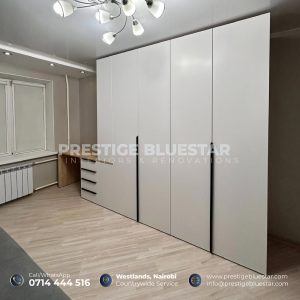 Floor-to-Ceiling Wardrobes: 10 Benefits for Modern Homes in Kenya 7 Custom wardrobe installation in a modern Kenyan bedroom