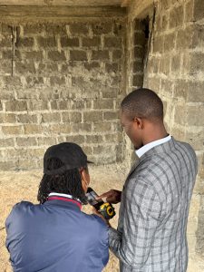 Professional interior designer conducting an on-site consultation before preparing a customized renovation quotation.