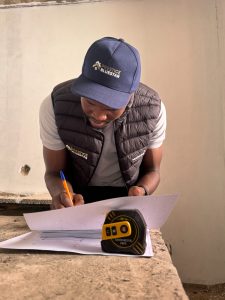 Professional interior designer conducting an on-site consultation before preparing a customized renovation quotation.